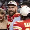 LAS VEGAS, NEVADA - FEBRUARY 11: Travis Kelce #87 of the Kansas City Chiefs and Taylor Swift react as they see Mecole Hardman Jr. #12 of the Kansas City Chiefs following the NFL Super Bowl 58 football game between the San Francisco 49ers and the Kansas City Chiefs at Allegiant Stadium on February 11, 2024 in Las Vegas, Nevada. (Photo by Michael Owens/Getty Images)